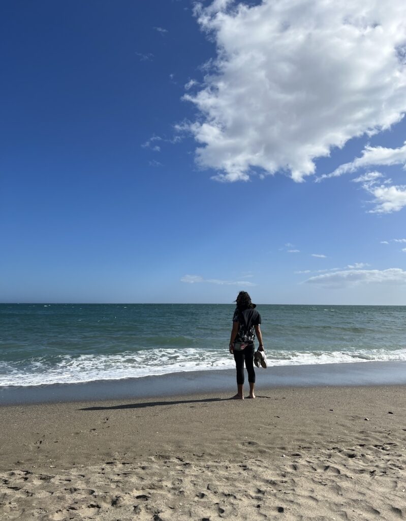 Man standing on the coast of Mijas